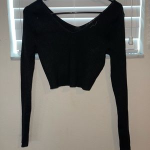 long sleeve black ribbed crop top with low v cut